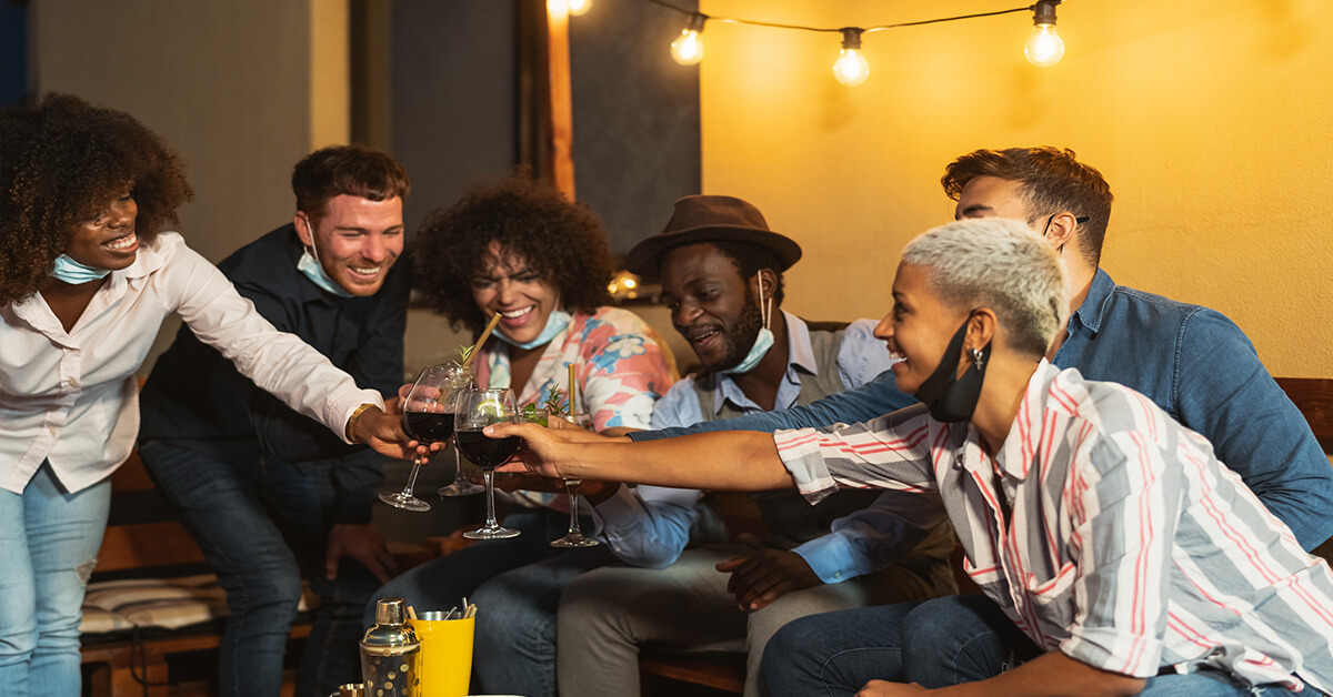 Small Gathering Fun with people cheersing