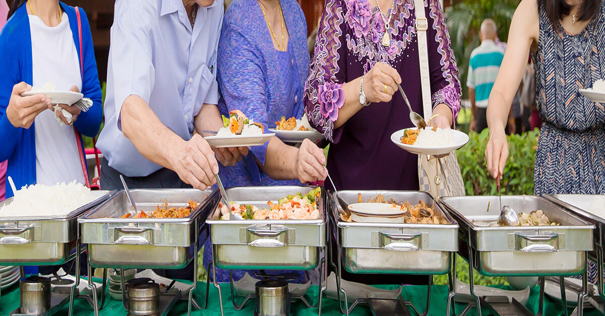 People eating at a business catering event