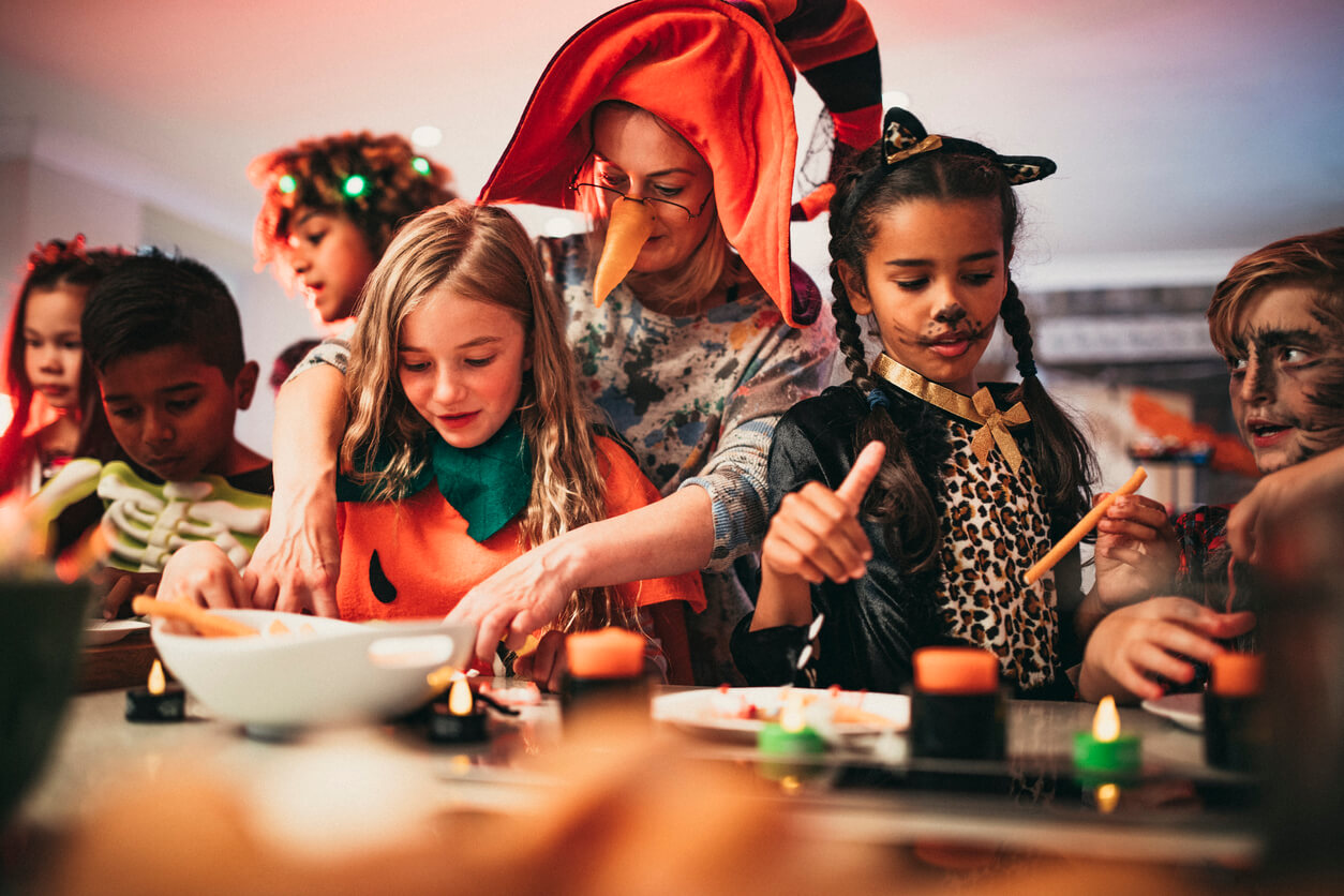 Kids and adults have fun at a Halloween party