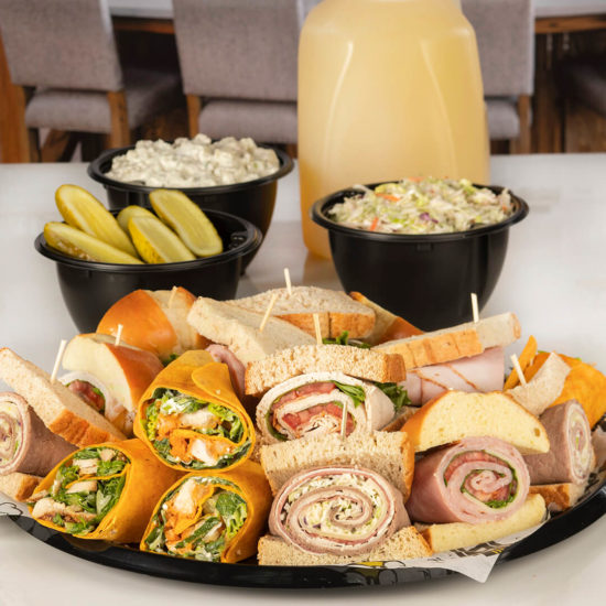 A platter of sandwiches and wraps